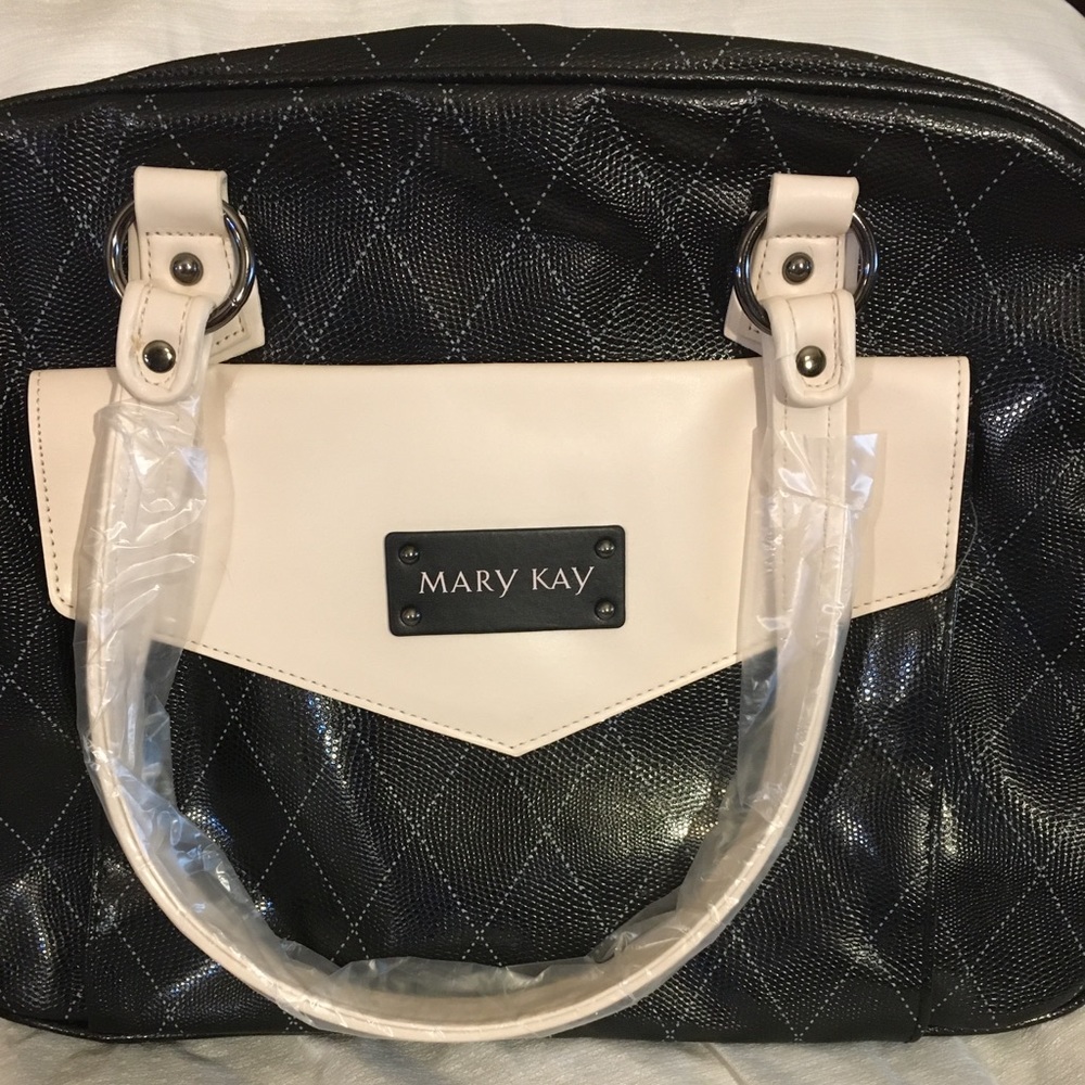 Brand new MaryKay bag with insert.